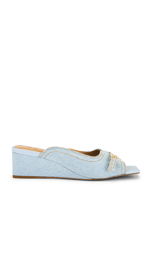 Ganni Butterfly Wedge Mule Sandal Denim in Denim-Light. Size 38. Also in 37, 39.